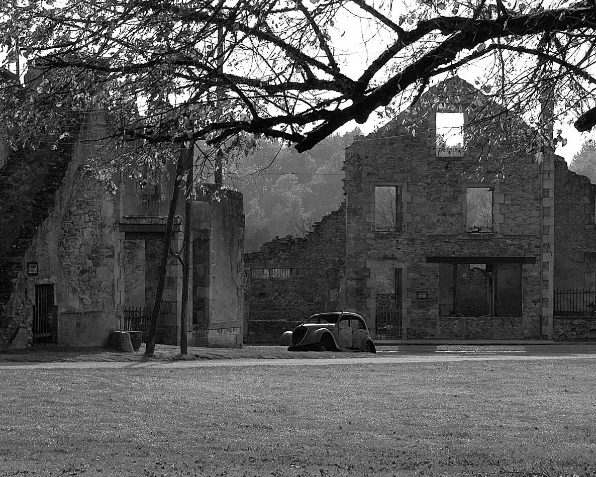 car inside Oradour sur glane black and with photo