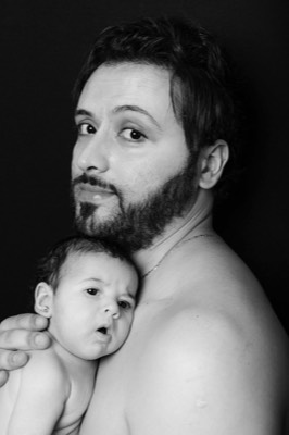  Man with newborn 