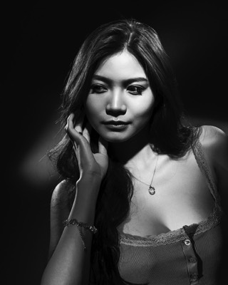  Black and white woman portrait in studio with continous lights 