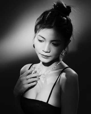  Black and white woman portrait in studio with continous lights 