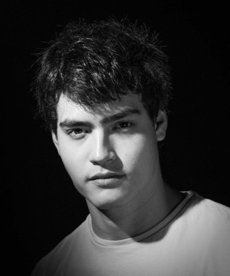  man corporate black and white portrait in studio with continous lights 