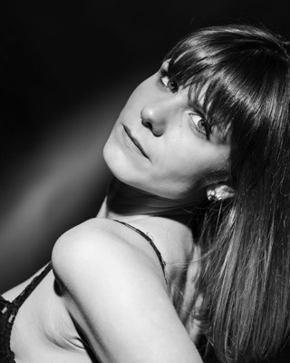  woman glamour black and white portrait in studio boudoir style 