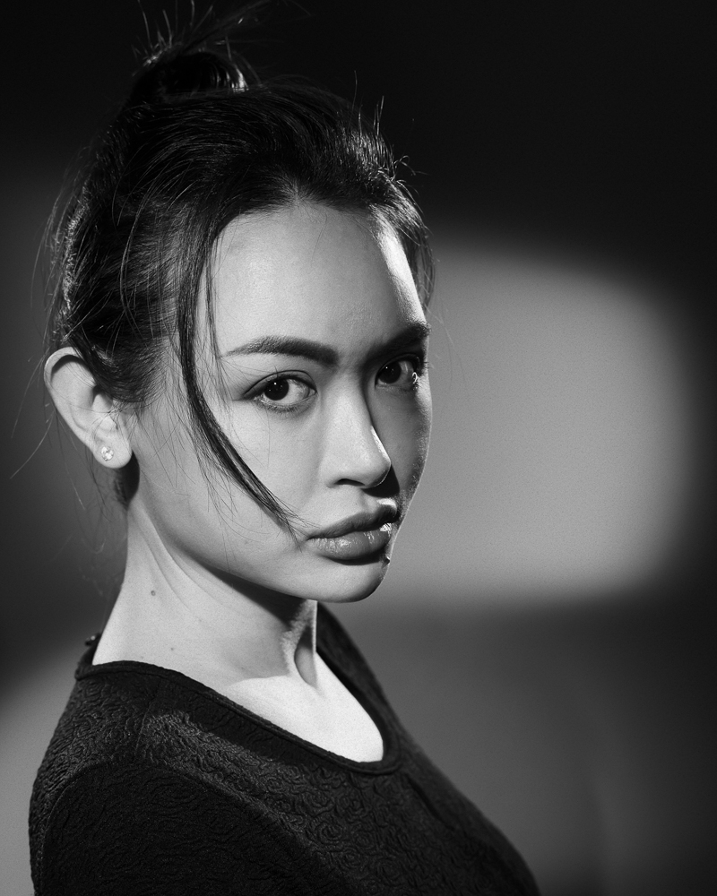  Black and white woman portrait in studio with continous lights 