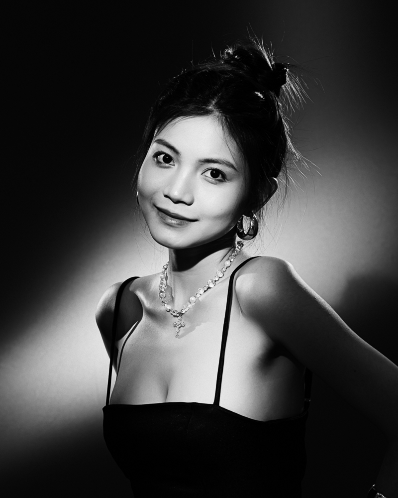  Black and white woman portrait in studio with continous lights 