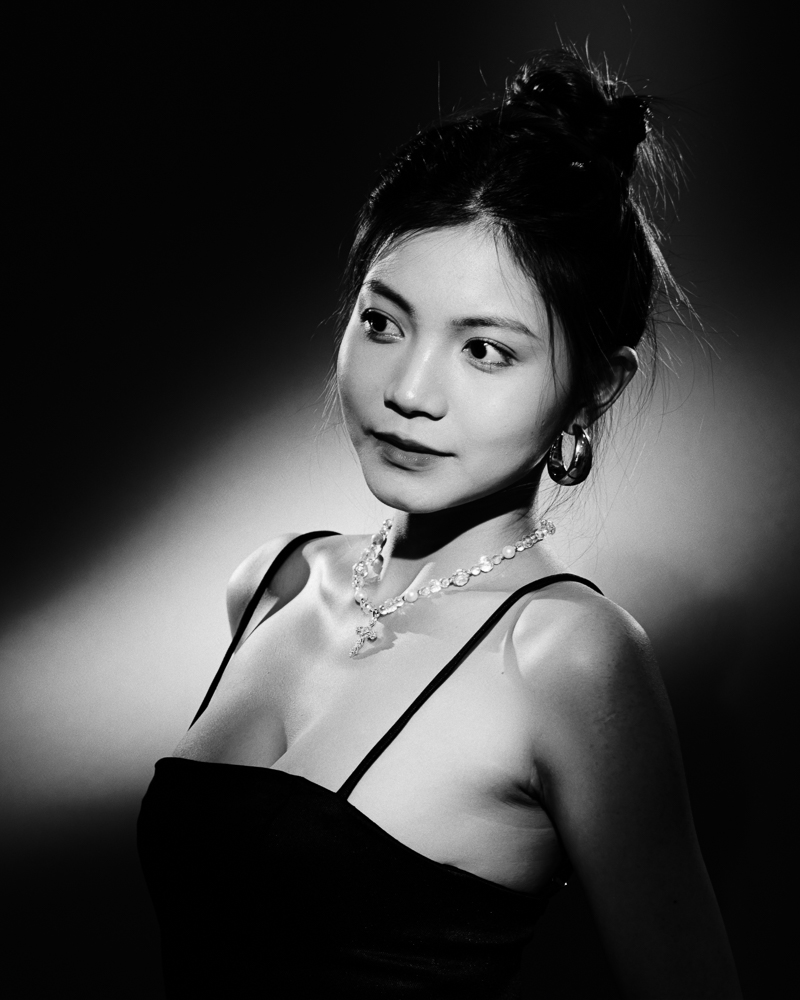  Black and white woman portrait in studio with continous lights 