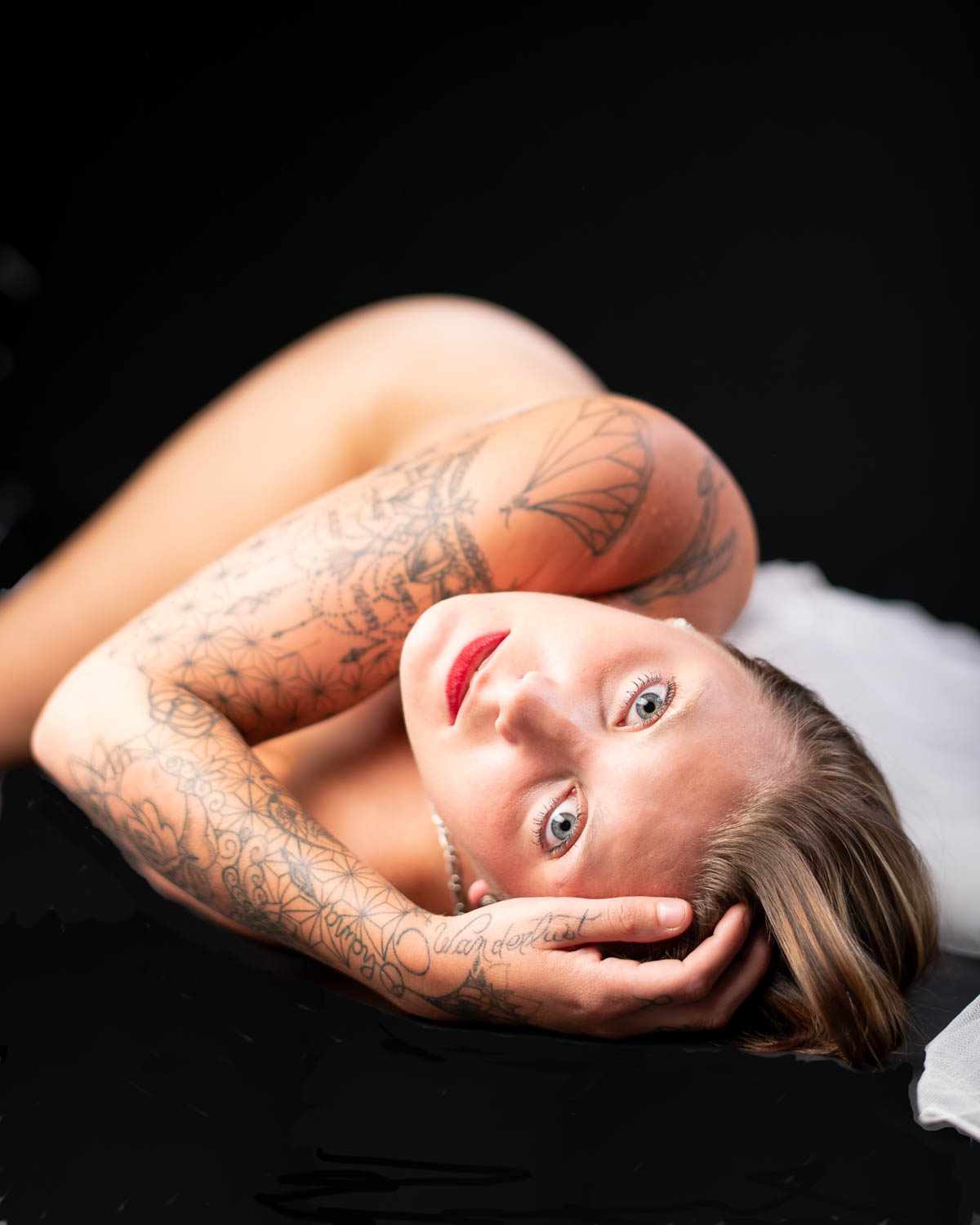  woman glamour color portrait in studio boudoir style 