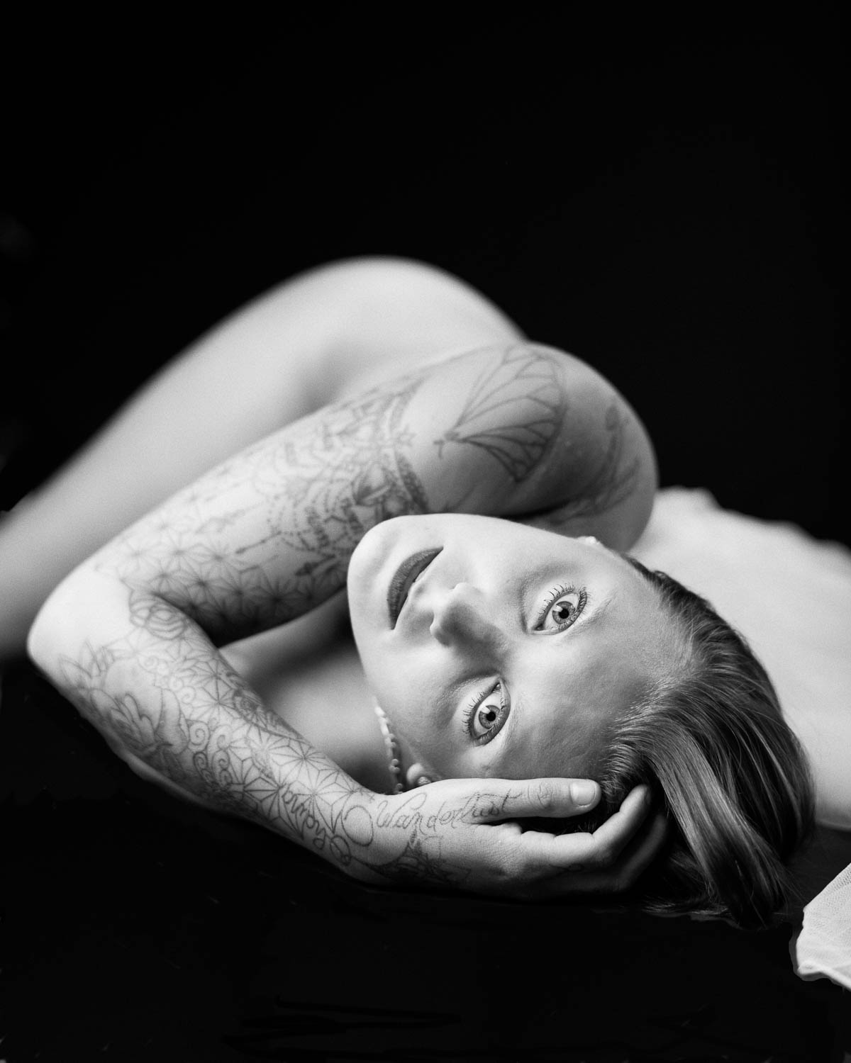  woman glamour black and white portrait in studio boudoir style 